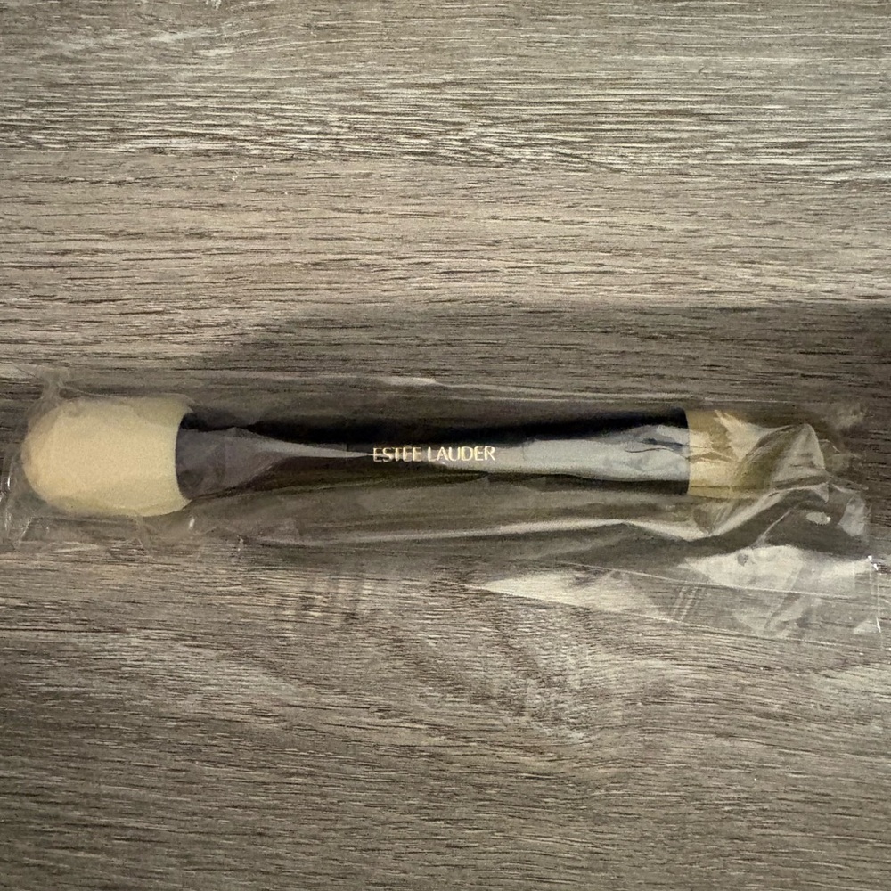 Estee Lauder Skincare Tool with Black and Cream Handle